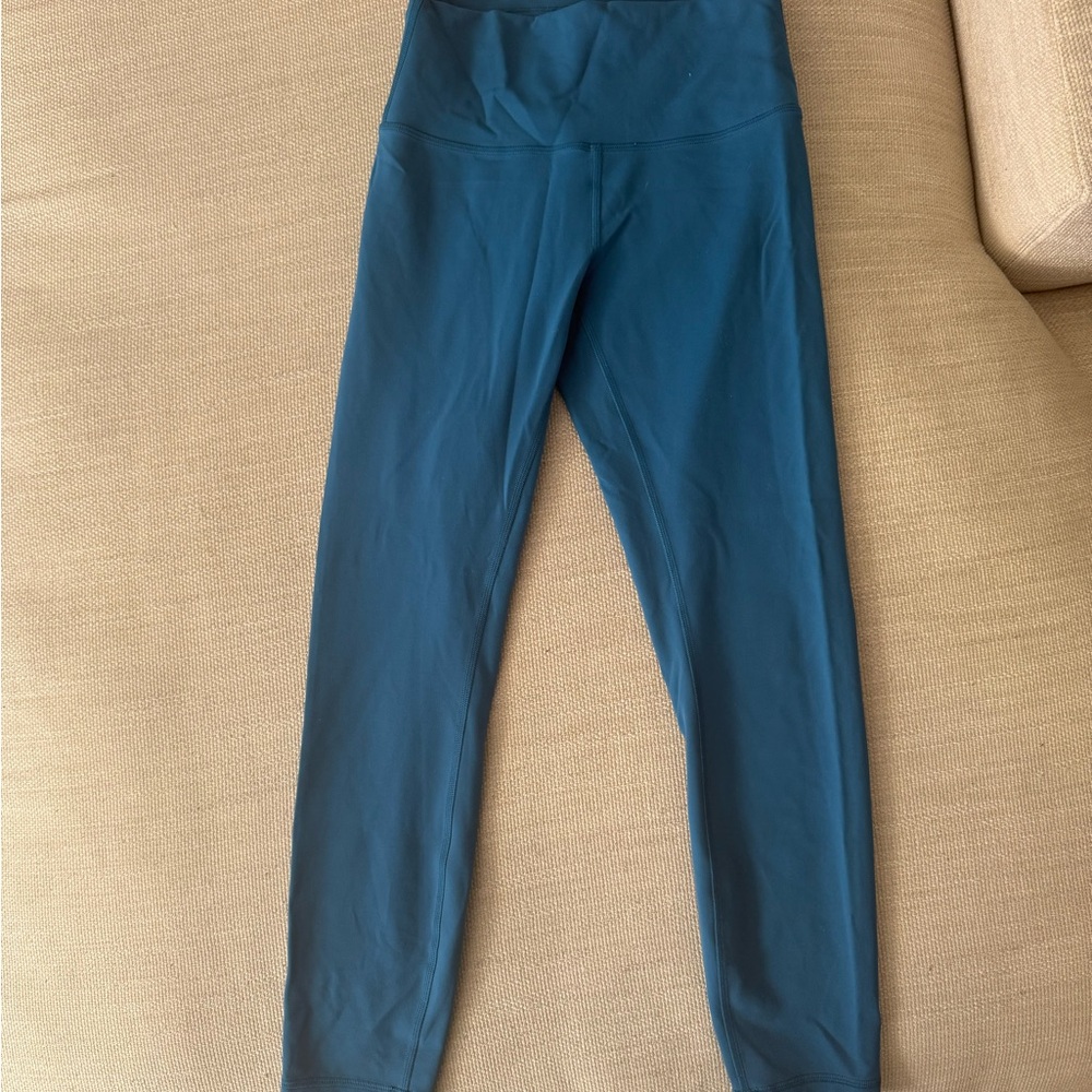 Lululemon Wunder Train High Rise Tight 23” inseam in teal size 6